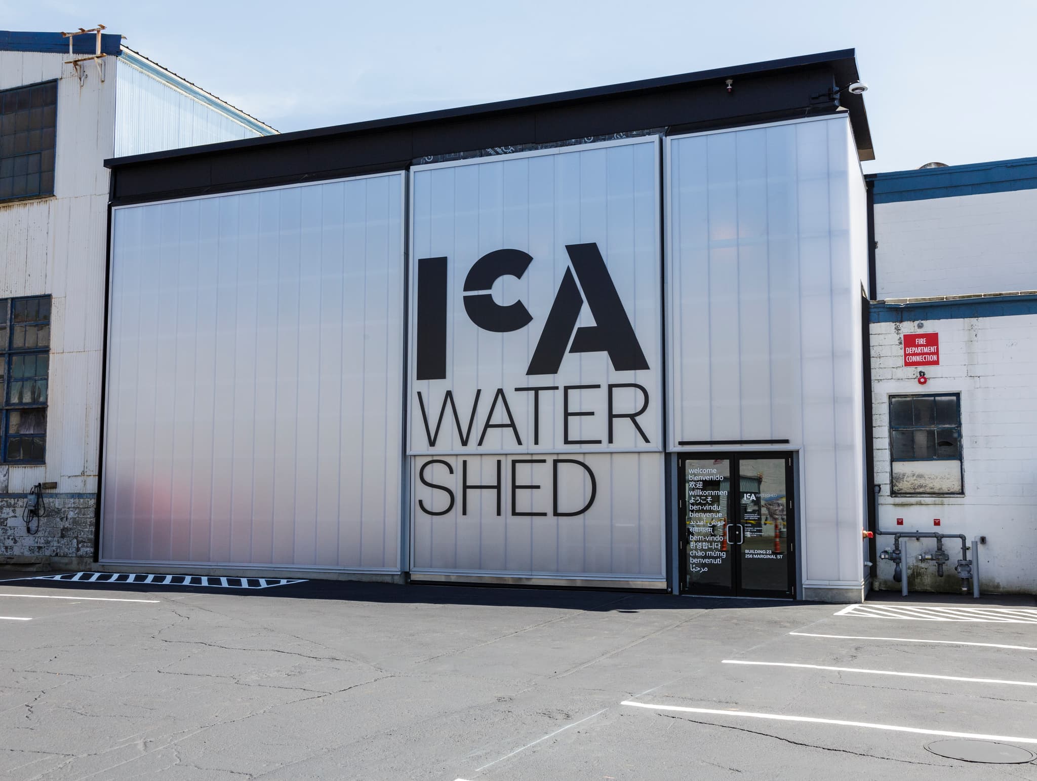 The exterior of the ICA Watershed, featuring lettering on the front of the strucutre, and an entrance.